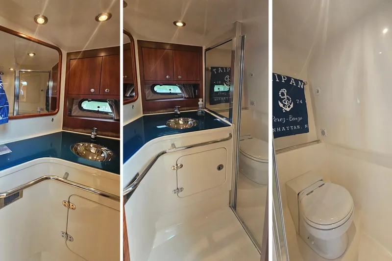 Slide: The Image of Luxurious 2006 Chris-Craft Corsair 36 yacht bathroom with wood accents and modern fixtures. - 26