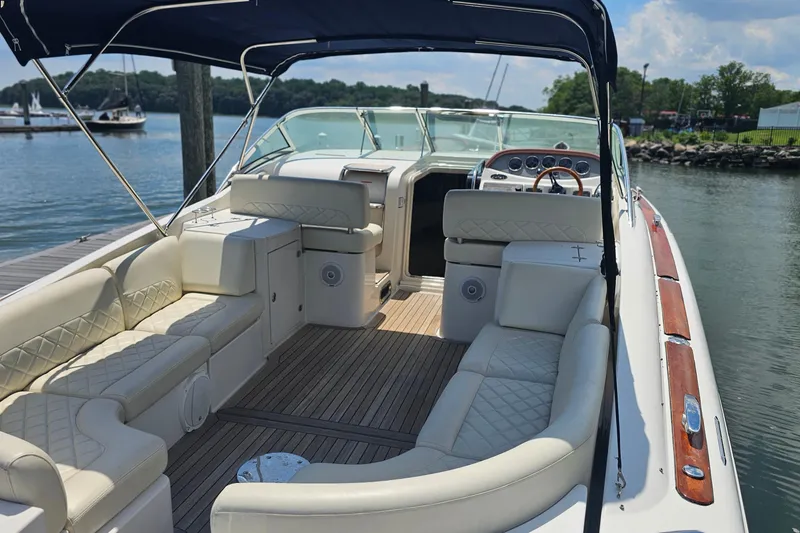 Slide: The Image of 2006 Chris-Craft Corsair 36 boat interior with luxurious seating and elegant design. - 7