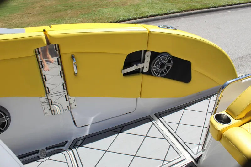 Slide: The Image of Yellow interior of 2021 Mystic M4200 boat with speaker and stainless steel hinge. - 29