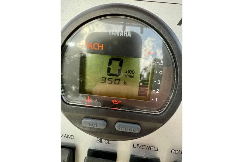 Slide: The Image of Yamaha tachometer displaying 350 hours on a 2016 Release 180 CC boat. - 20