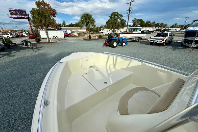 Slide: The Image of 2016 Release 180 CC boat on display in outdoor dealership lot. - 22