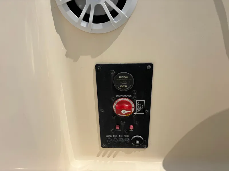 Slide: The Image of Control panel on 2022 Scout 210 Dorado boat, featuring digital relay and emergency switch. - 39
