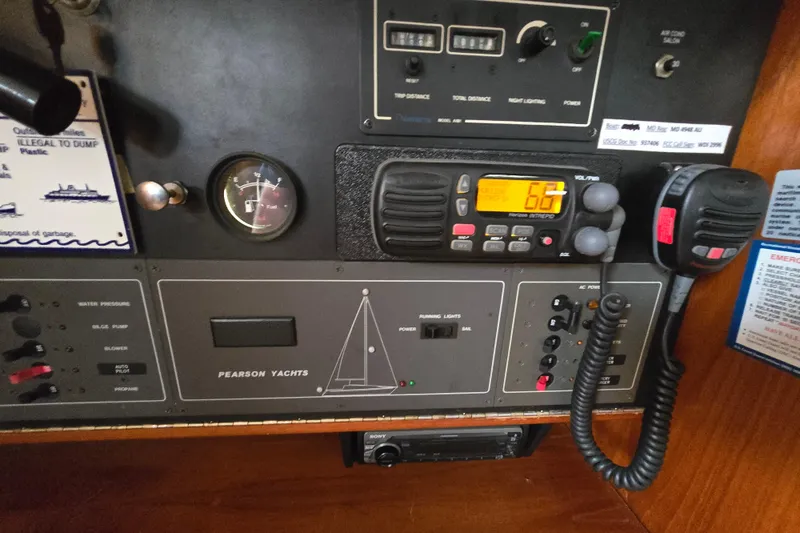 Slide: The Image of Engine of 1988 Pearson 365 Centerboard sailboat, showcasing belts and pulleys. - 18