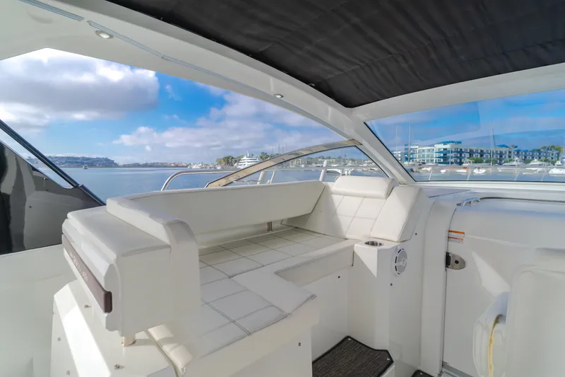 Slide: The Image of 2017 Cruisers Yachts 39 Express Coupe interior with waterfront view. - 30