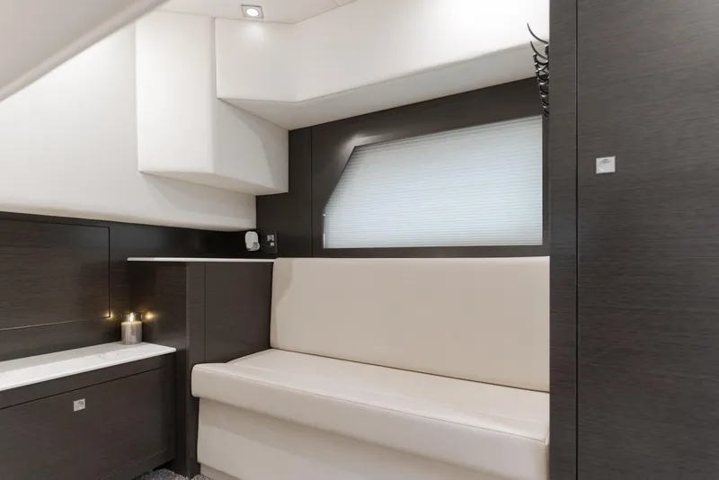 Slide: The Image of Luxurious interior of 2017 Cruisers Yachts 39 Express Coupe with modern seating and sleek design. - 43