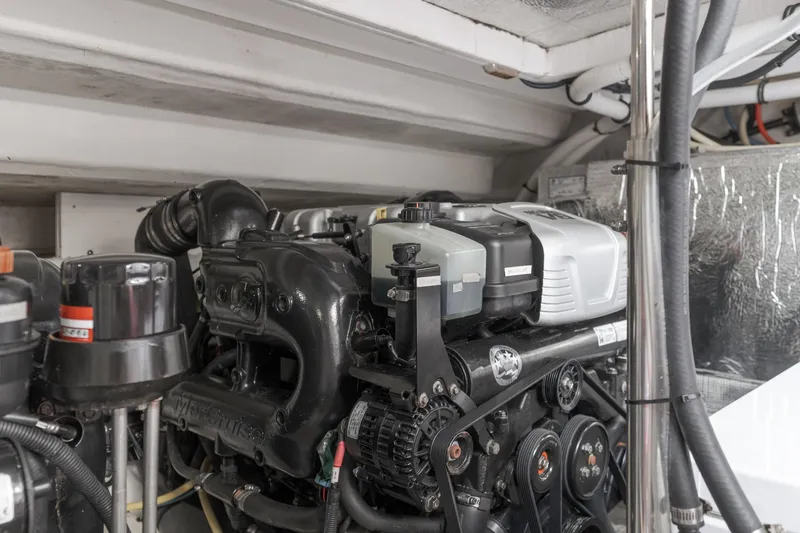 Slide: The Image of Engine compartment of 2017 Cruisers Yachts 39 Express Coupe, showcasing detailed machinery. - 49