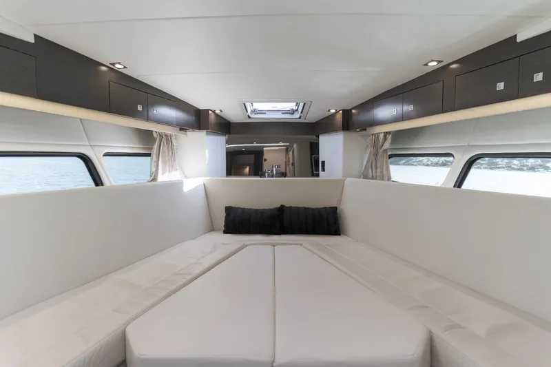 Slide: The Image of Luxurious interior of 2017 Cruisers Yachts 39 Express Coupe with elegant seating and windows. - 37