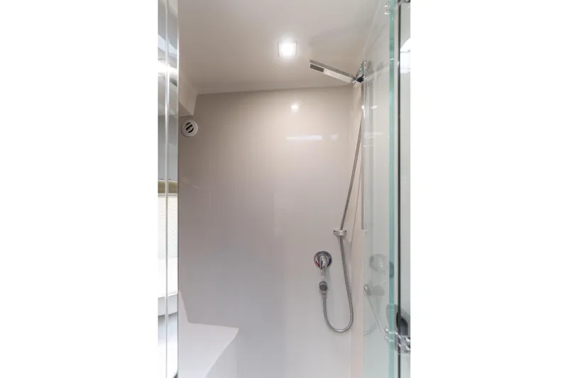 Slide: The Image of Shower area in 2017 Cruisers Yachts 39 Express Coupe, featuring modern fixtures and sleek design. - 45