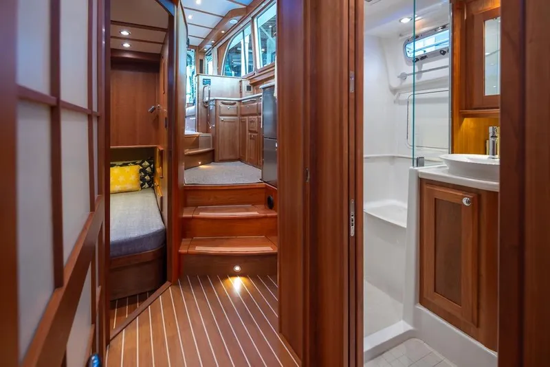 Slide: The Image of Interior of 2020 Sabre 45 Salon Express yacht, featuring wood finishes and modern amenities. - 27