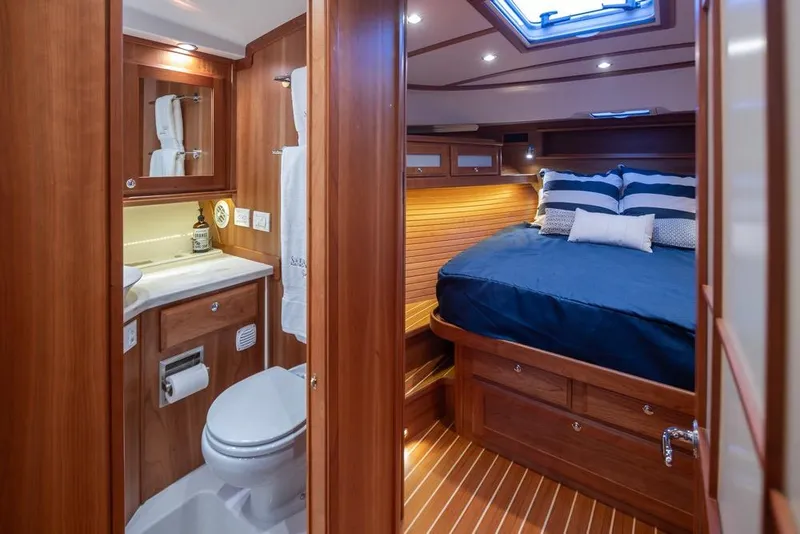 Slide: The Image of Luxurious interior of 2020 Sabre 45 Salon Express yacht with cozy bedroom and bathroom. - 29