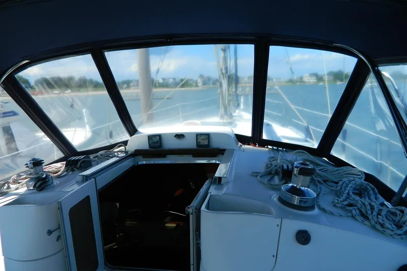 Slide: The Image of Interior view of 2007 Hunter 41 AC sailboat cockpit with ropes and controls. - 5