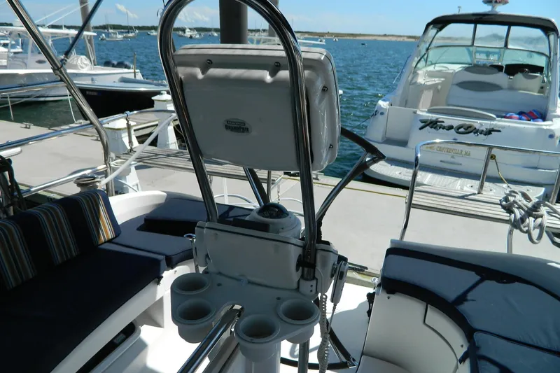 Slide: The Image of Cockpit view of 2007 Hunter 41 AC sailboat with seating and steering wheel. - 6