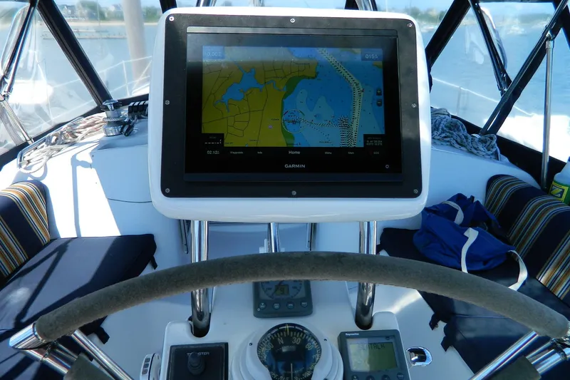 Slide: The Image of Cockpit of 2007 Hunter 41 AC sailboat with Garmin navigation display. - 8