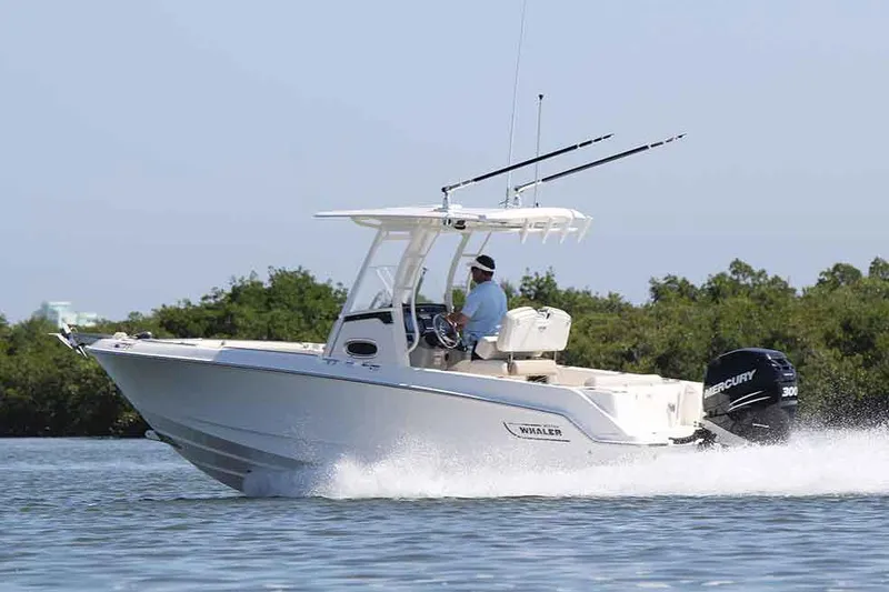 Slide: The Image of Manufacturer Provided Image: 2018 Boston Whaler 230 Outrage boat cruising on water. - 16