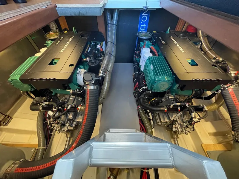 Slide: The Image of Engine room of 2021 Beneteau Swift Trawler 41 Fly with dual engines. - 27