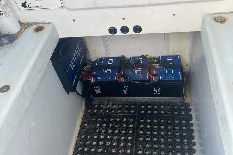 Slide: The Image of Battery compartment of a 2011 Contender 32 ST boat with Ionic lithium batteries. - 8