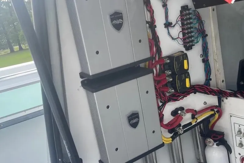 Slide: The Image of Electrical system of a 2011 Contender 32 ST boat, featuring wiring and components. - 9