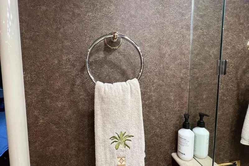 Slide: The Image of Towel and toiletries in 2004 Lazzara SC Motor Yacht bathroom. - 33