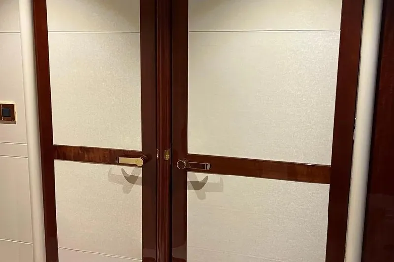 Slide: The Image of Wooden interior doors on 2004 Lazzara SC Motor Yacht. - 36