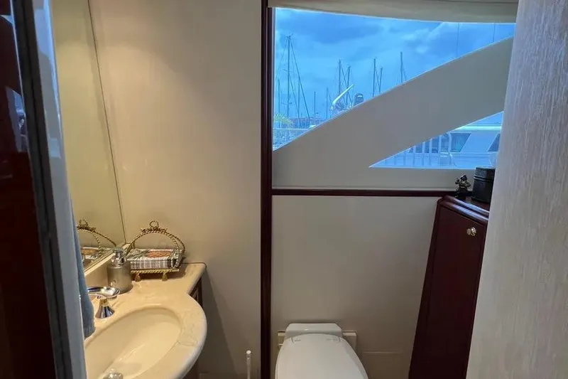 Slide: The Image of Luxurious bathroom interior of 2004 Lazzara SC Motor Yacht with marina view. - 45
