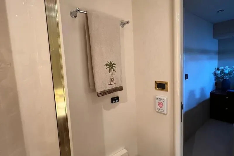 Slide: The Image of Luxury bathroom interior of 2004 Lazzara SC Motor Yacht with decorative towel. - 64