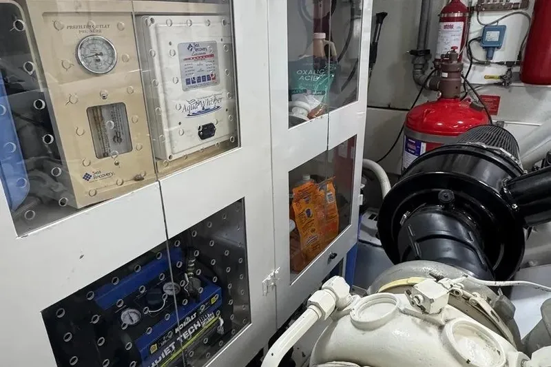 Slide: The Image of Engine room of 2004 Lazzara SC Motor Yacht with equipment and safety gear. - 75
