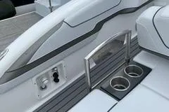 Slide: The Image of 2018 Formula 350 Crossover Bowrider interior with cup holders and sleek design. - 23