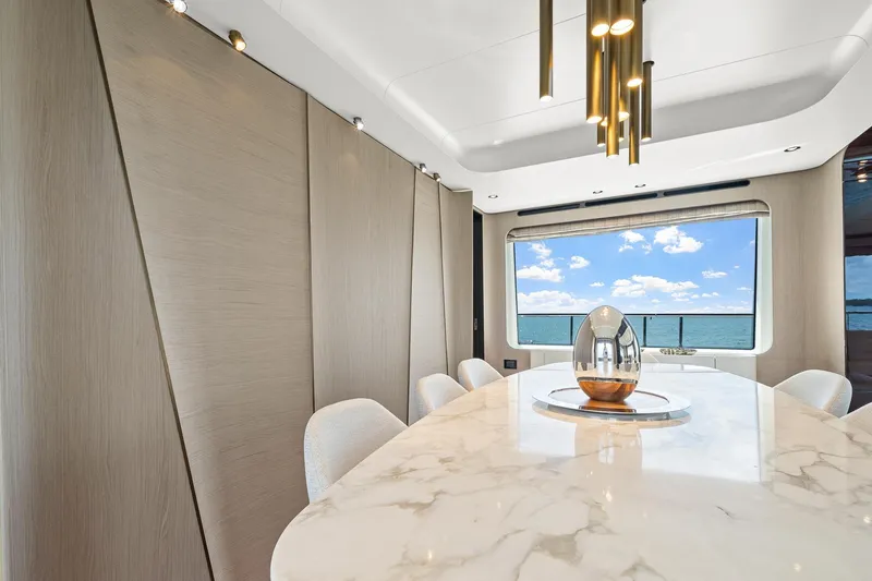 Slide: The Image of Luxurious dining area on 2022 Azimut Grande 27 METRI yacht with ocean view. - 102