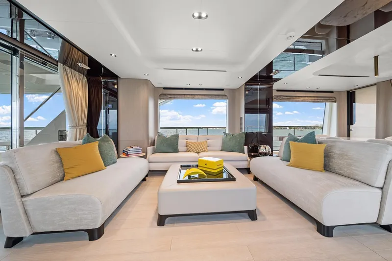 Slide: The Image of Luxurious interior of 2022 Azimut Grande 27 METRI yacht with elegant seating and panoramic views. - 109