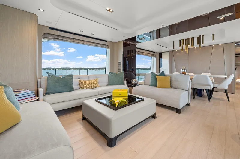 Slide: The Image of Luxurious interior of 2022 Azimut Grande 27 METRI yacht with elegant seating and sea view. - 110