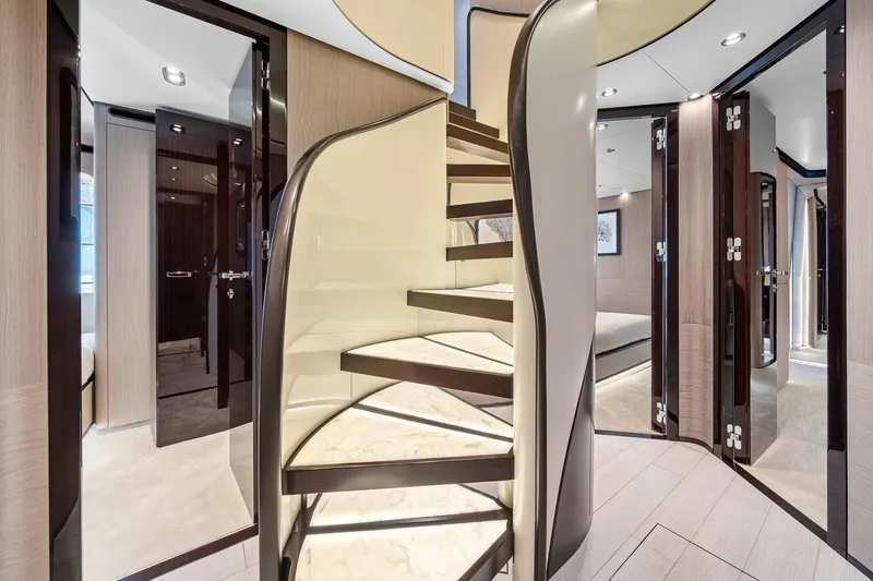 Slide: The Image of Luxurious interior of 2022 Azimut Grande 27 METRI yacht with elegant spiral staircase. - 118