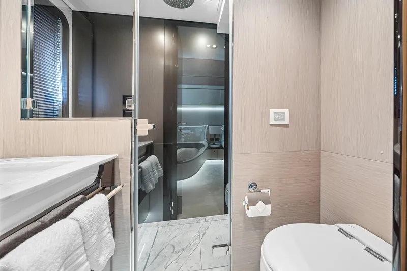 Slide: The Image of Luxurious bathroom in 2022 Azimut Grande 27 METRI yacht with modern fixtures and elegant design. - 119