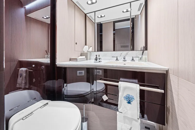 Slide: The Image of Luxurious bathroom in 2022 Azimut Grande 27 METRI yacht, featuring elegant fixtures and modern design. - 125