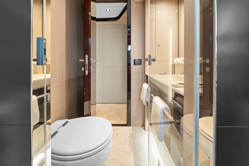 Slide: The Image of Luxurious bathroom interior of 2022 Azimut Grande 27 METRI yacht, featuring modern design elements. - 127