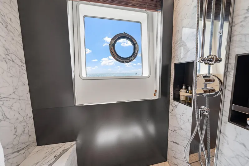 Slide: The Image of Luxurious bathroom on 2022 Azimut Grande 27 METRI yacht with marble and ocean view. - 130