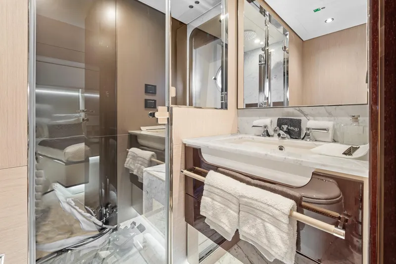 Slide: The Image of Luxurious bathroom in 2022 Azimut Grande 27 METRI yacht with elegant fixtures and modern design. - 135