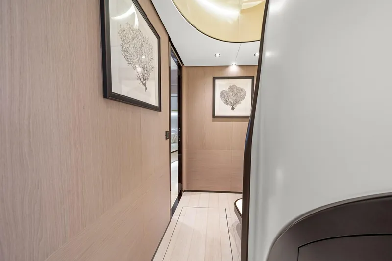 Slide: The Image of Luxurious interior hallway of 2022 Azimut Grande 27 METRI yacht with elegant artwork. - 136