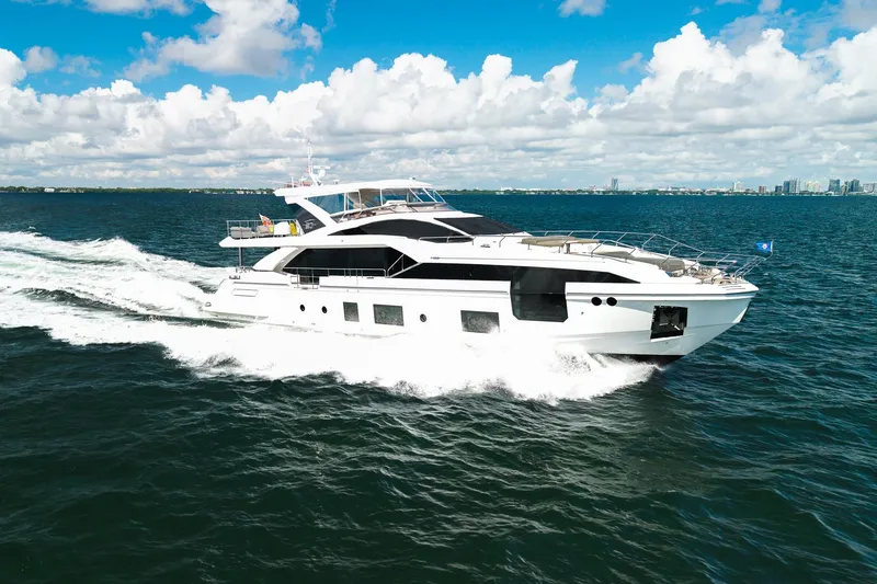 Slide: The Image of Luxury Azimut Grande 27 METRI yacht cruising on open water, 2022 model. - 14