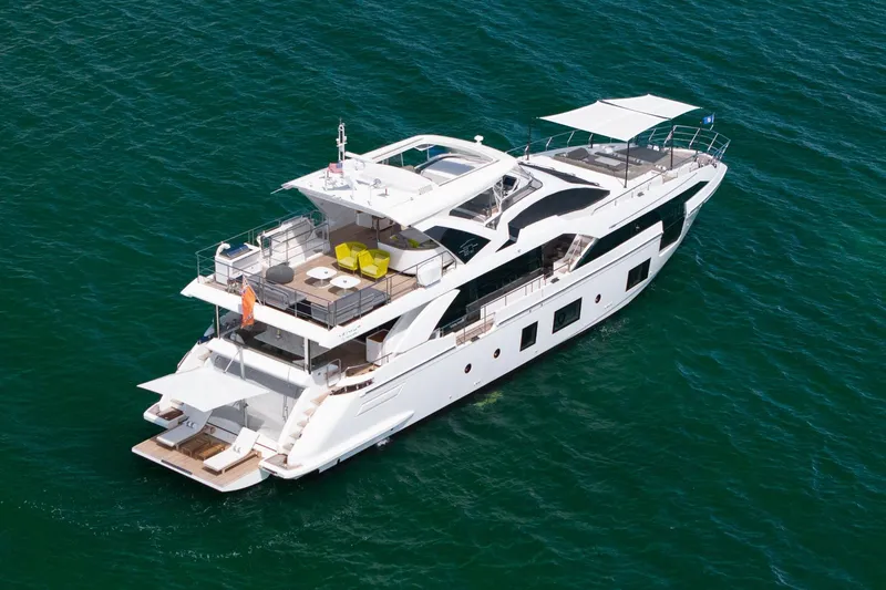The Image of Luxurious 2022 Azimut Grande 27 METRI yacht cruising on open water. - 2