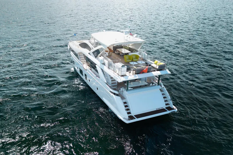 Slide: The Image of 2022 Azimut Grande 27 METRI yacht cruising on open water. - 31