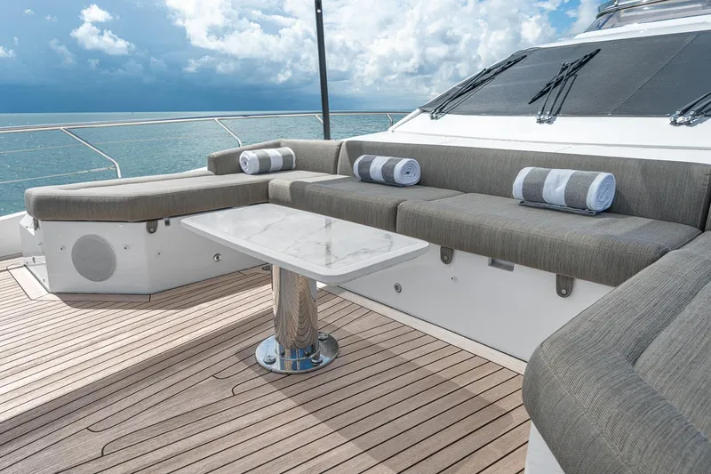 Slide: The Image of Luxurious deck seating on 2022 Azimut Grande 27 METRI yacht with ocean view. - 39