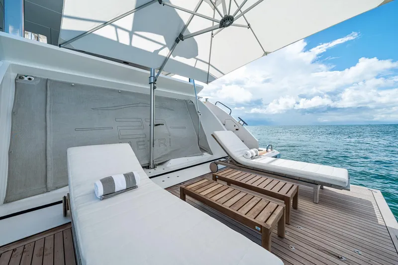 Slide: The Image of Luxurious deck of 2022 Azimut Grande 27 METRI yacht with sun loungers and ocean view. - 51