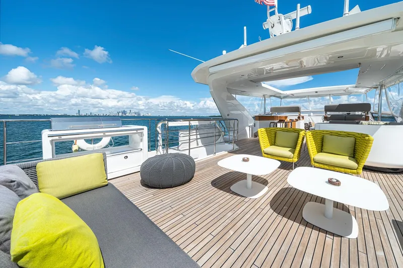 Slide: The Image of Luxurious deck of 2022 Azimut Grande 27 METRI yacht with modern seating and ocean view. - 64
