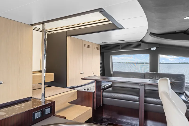 Slide: The Image of Luxurious interior of 2022 Azimut Grande 27 METRI yacht with modern furnishings and sea view. - 75