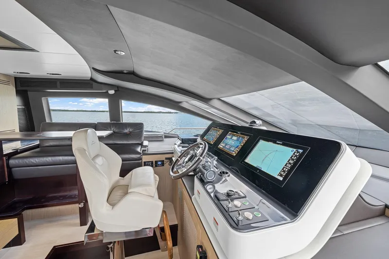 Slide: The Image of Luxurious helm of 2022 Azimut Grande 27 METRI yacht with advanced navigation systems. - 76
