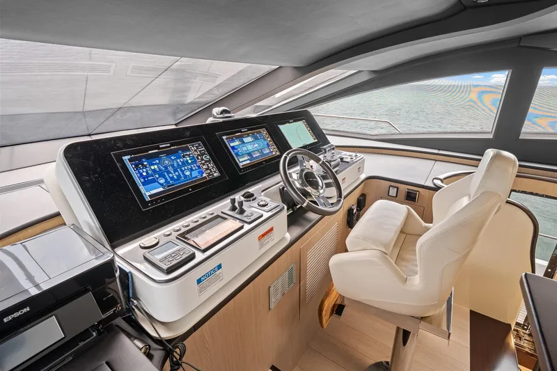 Slide: The Image of Luxurious helm of 2022 Azimut Grande 27 METRI yacht with advanced navigation systems. - 79