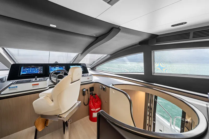 Slide: The Image of Helm of 2022 Azimut Grande 27 METRI yacht with modern controls and ocean view. - 81