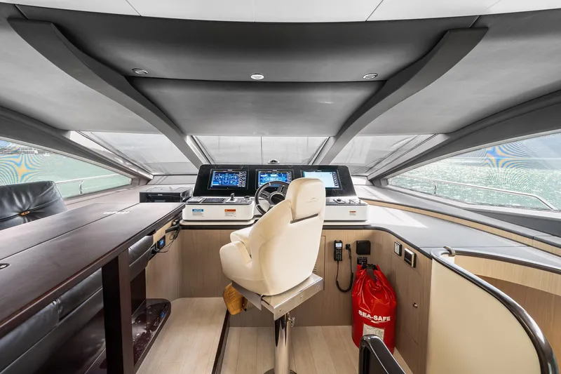 Slide: The Image of Luxurious helm of 2022 Azimut Grande 27 METRI yacht with modern navigation systems. - 82