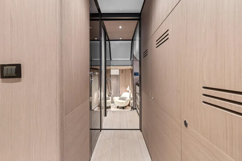 Slide: The Image of Luxurious interior hallway of 2022 Azimut Grande 27 METRI yacht with modern design. - 86