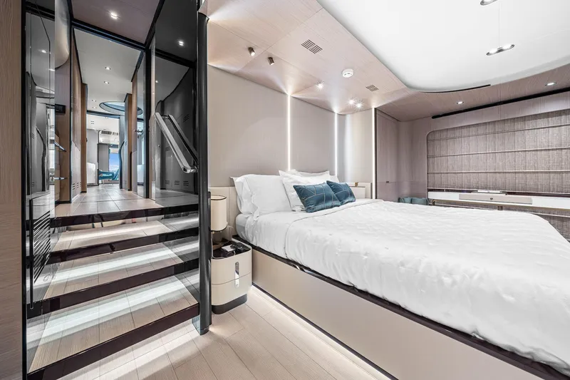 Slide: The Image of Luxurious bedroom interior of 2022 Azimut Grande 27 METRI yacht, featuring modern design and elegant decor. - 87